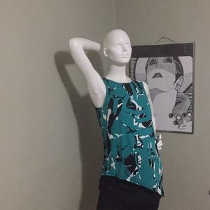 Size small asymmetrical teal and black top silky